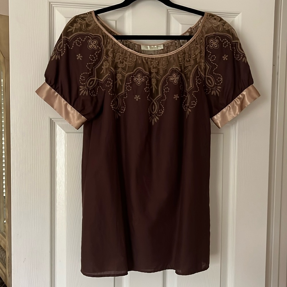 Beautiful brown cotton blouse with embroidery and satin trim on sleeves.